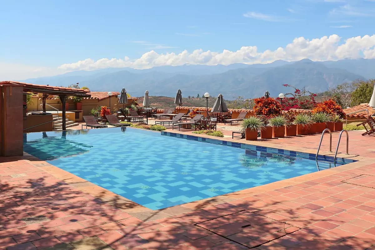Hotel pool terrace with a mountain view
